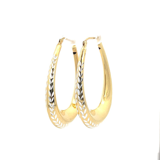 Creolen aus 925er Silber, 14 Karat gelbvergoldet, mit geschliffenen Details