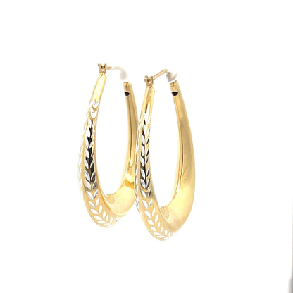 Creolen aus 925er Silber, 14 Karat gelbvergoldet, mit geschliffenen Details