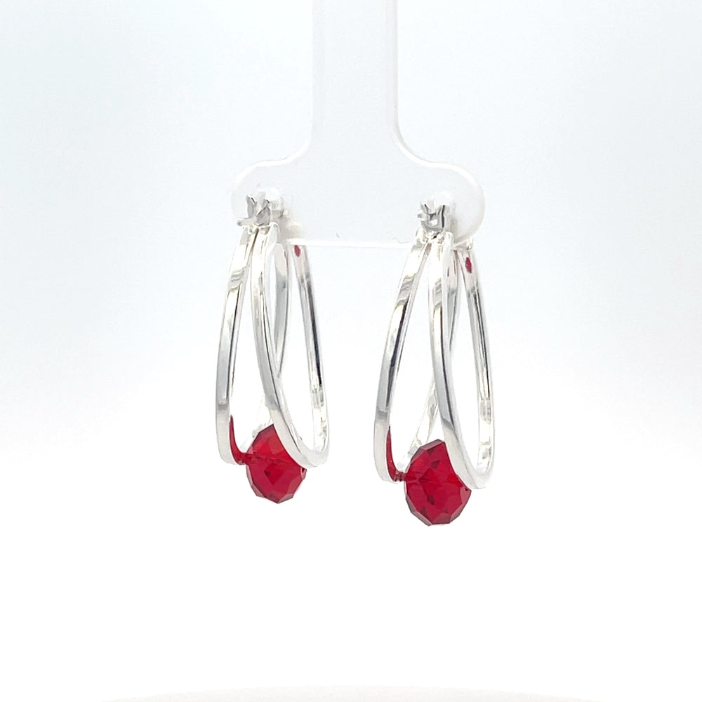 925er Silbercreolen mit rotem Stein