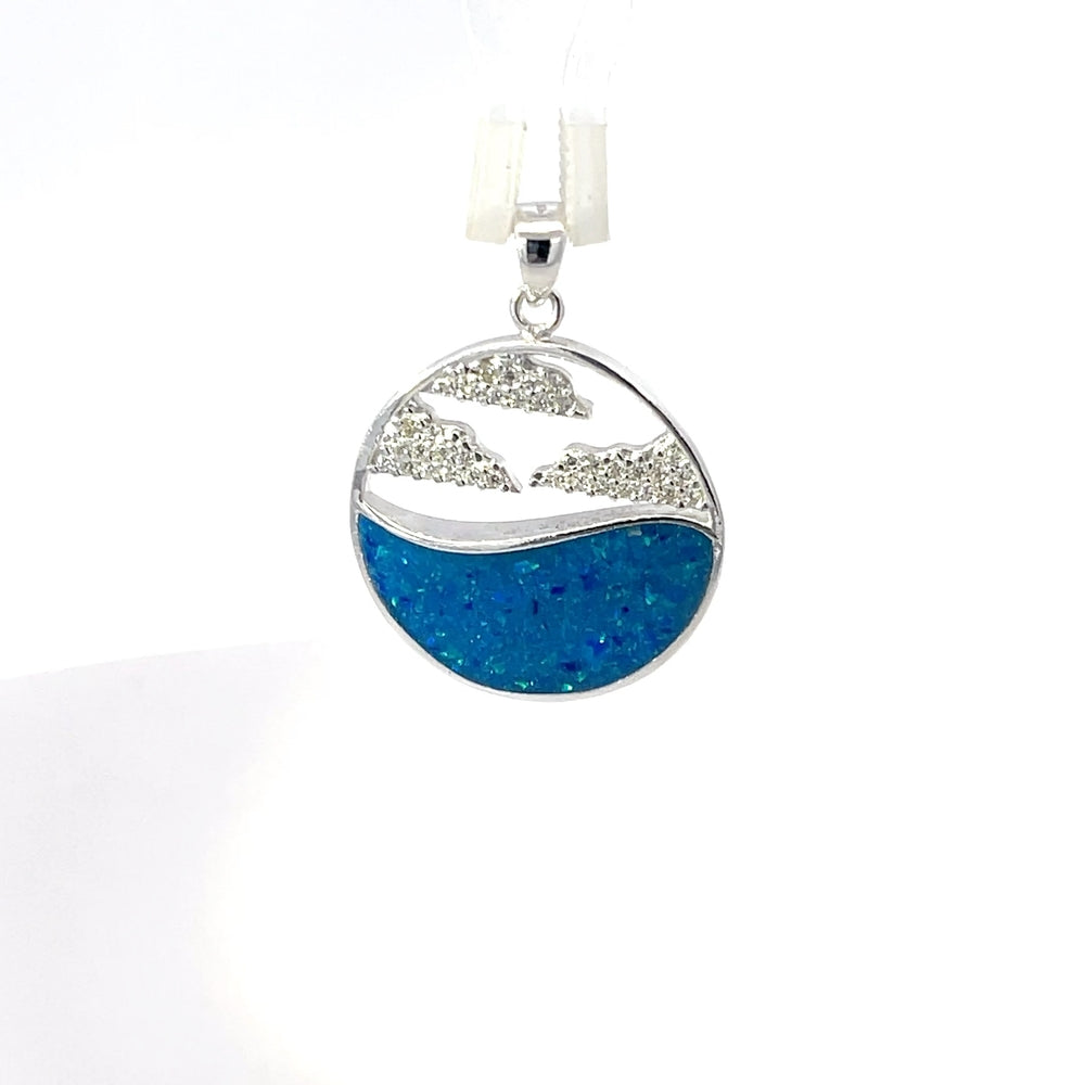 Runder Anhänger aus 925er Sterlingsilber mit Ozeanmotiv und blauer Harzveredelung