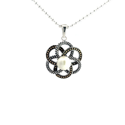 Anhänger aus 925er Silber mit Blumenmotiv und Perlenakzent