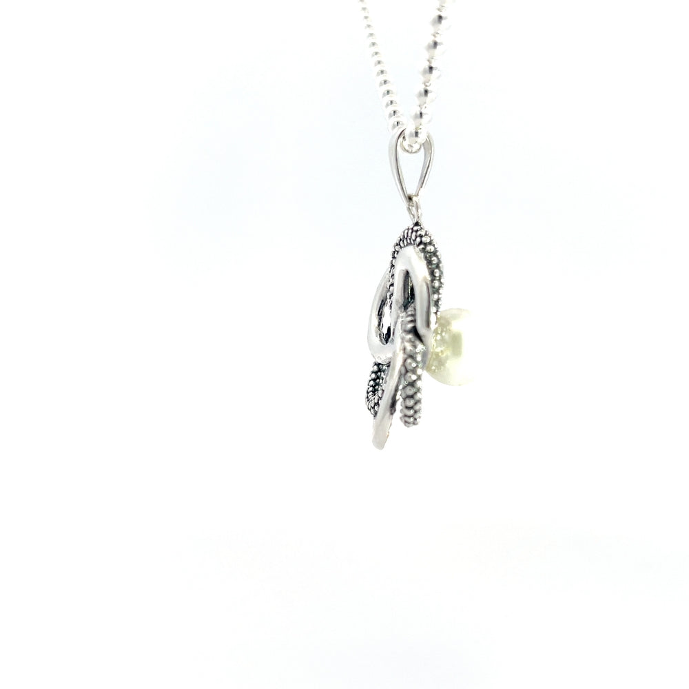 Anhänger aus 925er Silber mit Blumenmotiv und Perlenakzent