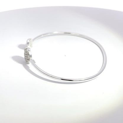 Offener Armreif aus 925er Sterlingsilber mit Pavé-Kugel-Verzierungen