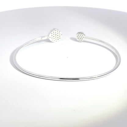 Offener Armreif aus 925er Sterlingsilber mit Pavé-Kugel-Verzierungen