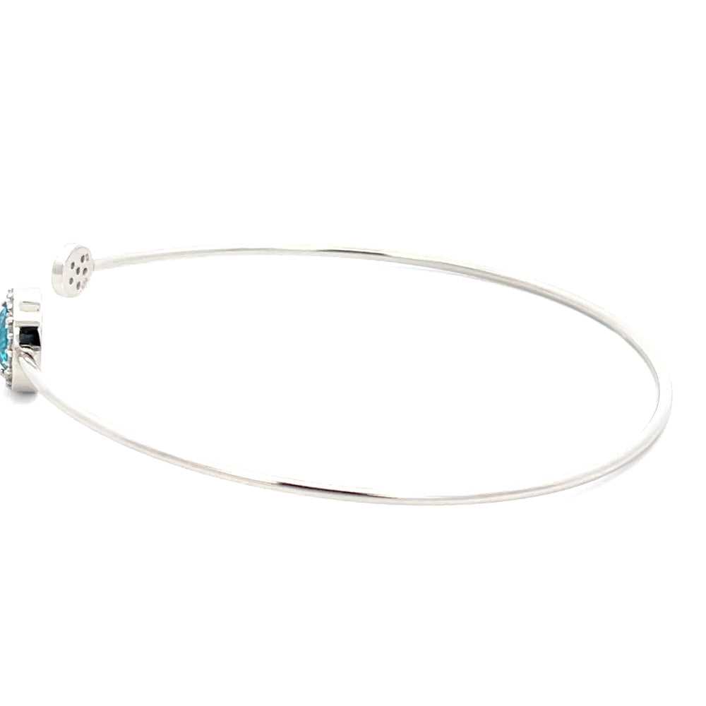 Offener Armreif aus 925er Silber mit blauem Zirkonia