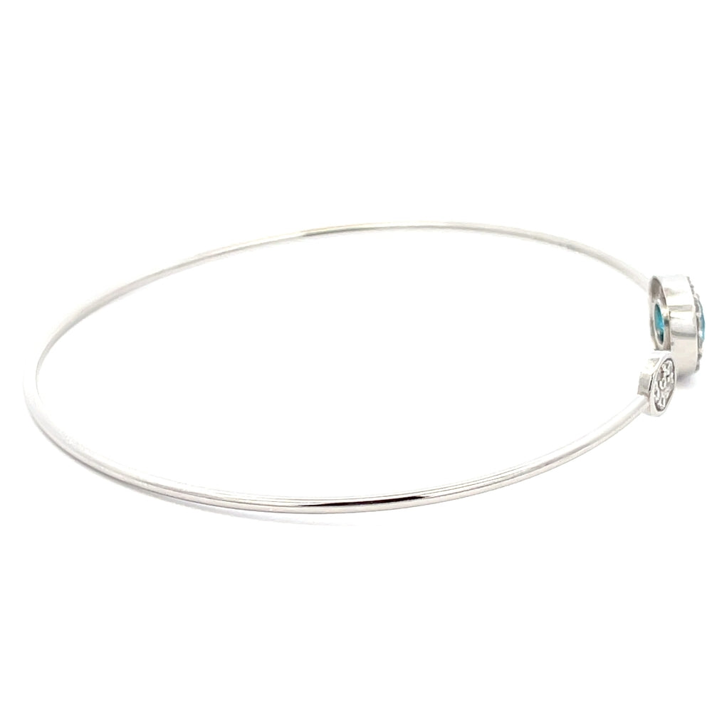 Offener Armreif aus 925er Silber mit blauem Zirkonia
