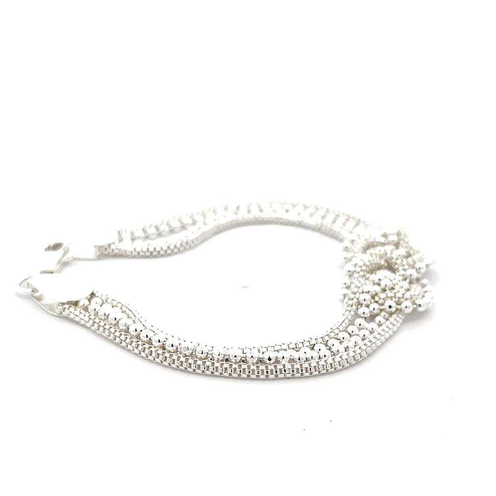 Doppellagiges Armband aus 925er Silber mit zentralem Knoten