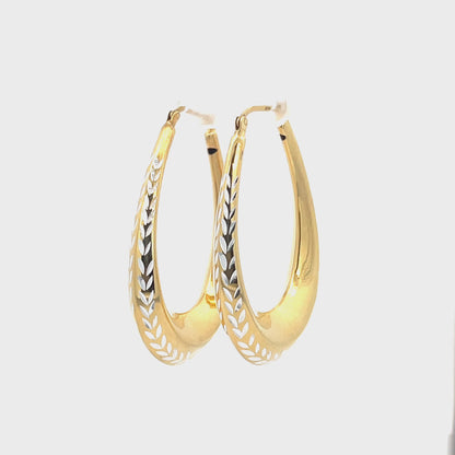 Creolen aus 925er Silber, 14 Karat gelbvergoldet, mit geschliffenen Details