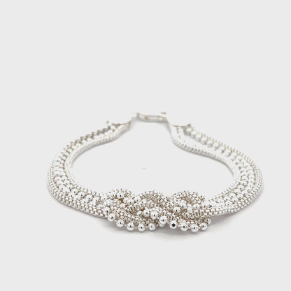 Doppellagiges Armband aus 925er Silber mit zentralem Knoten